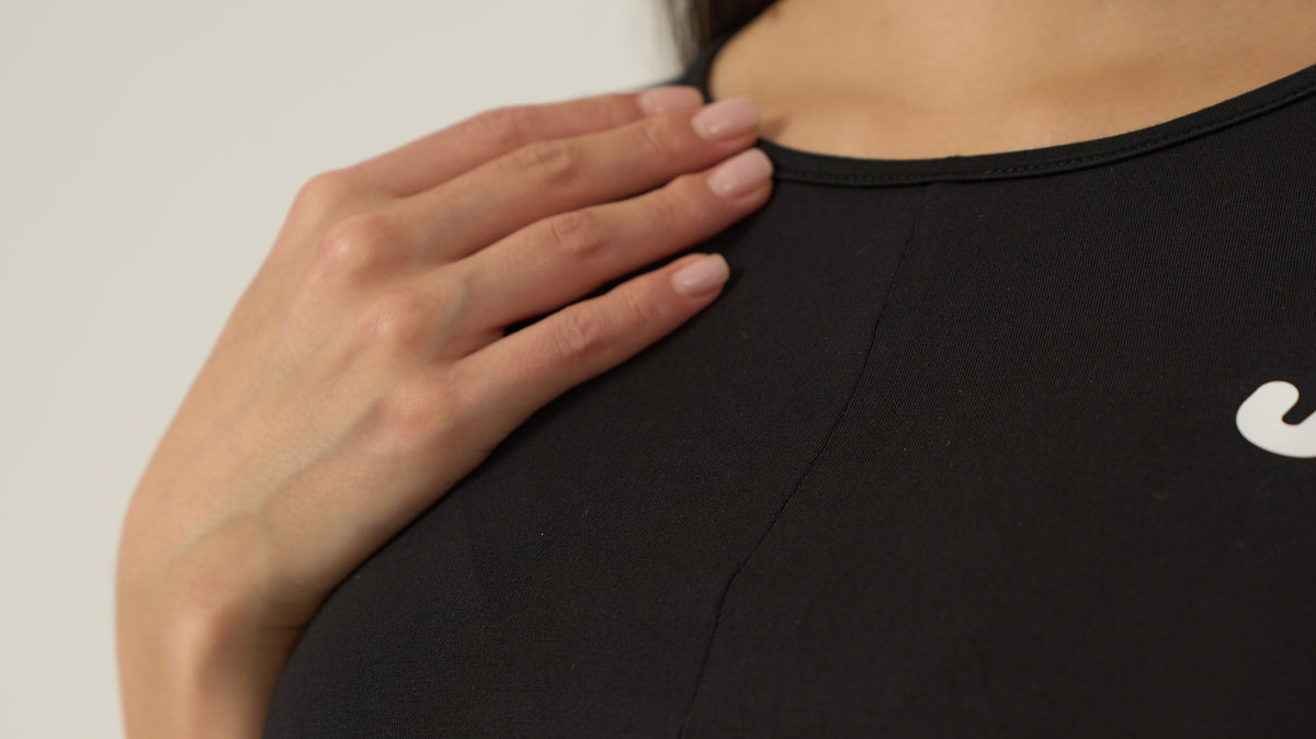 Close up of the Urthlete fitted tank fabric in coal black