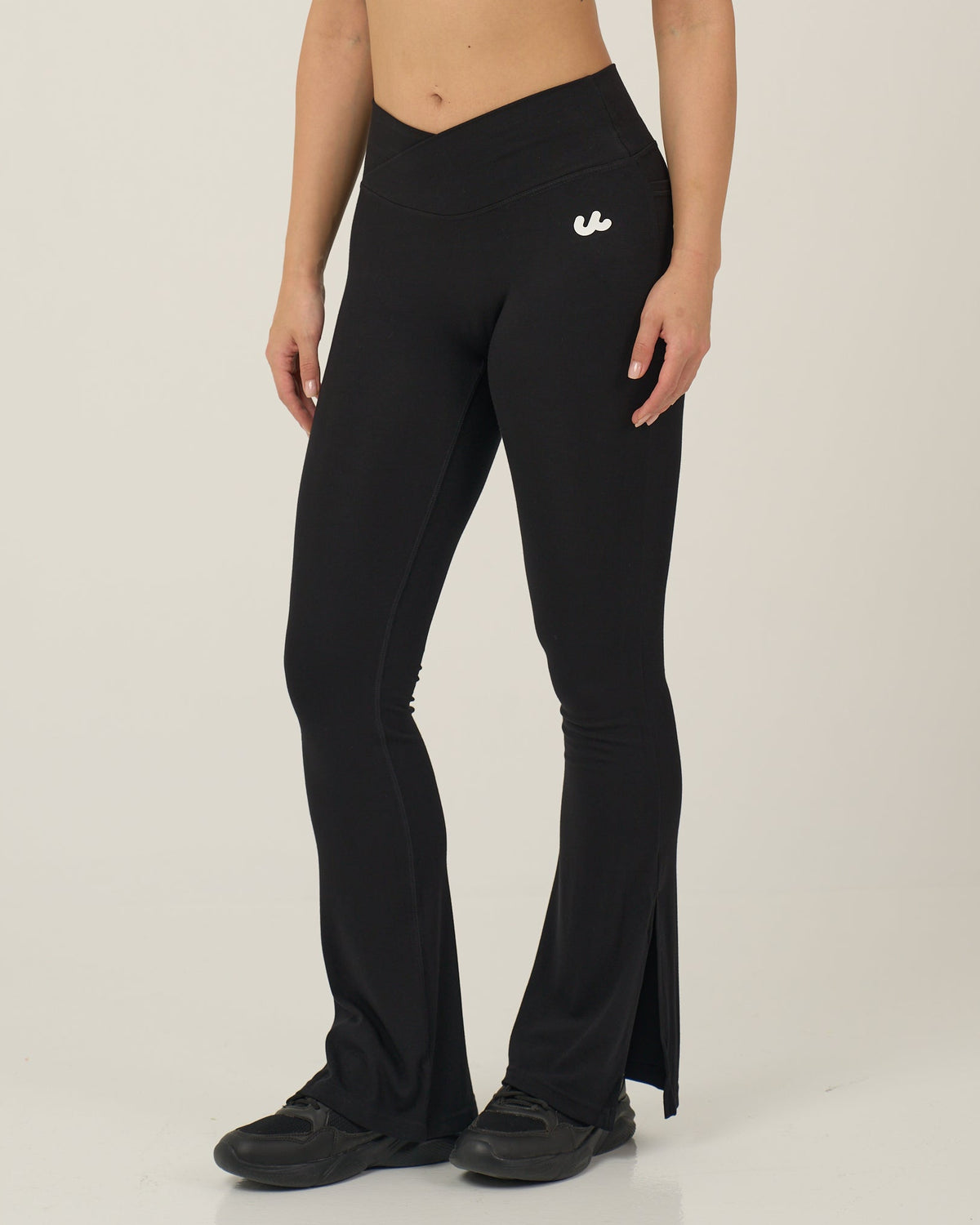 Urthlete bamboo flare leggings in coal black with a split hem
