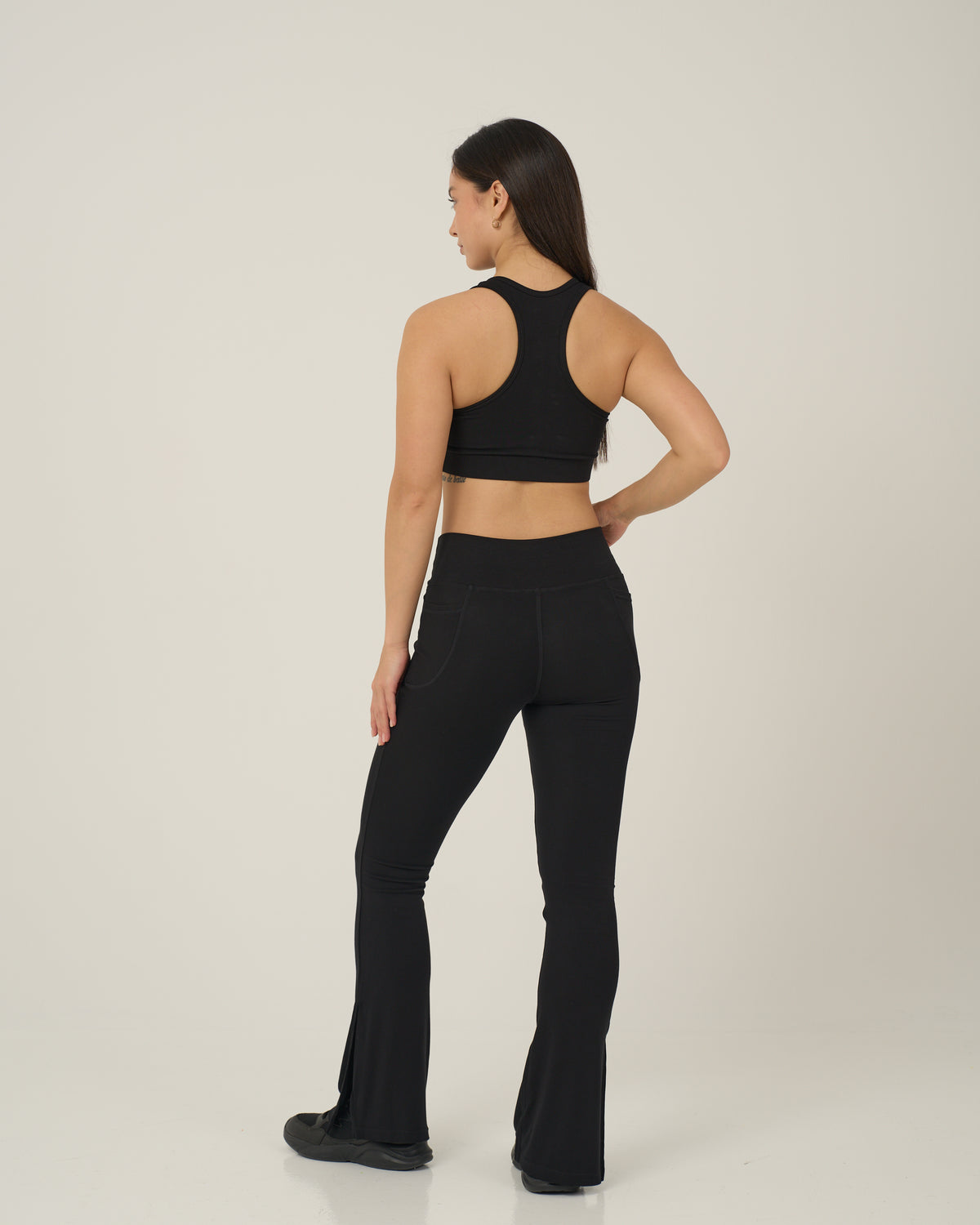 Back view of the Urthlete bamboo sports bra in coal black showing the racerback
